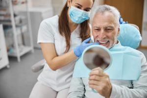 tooth implant vs bridge what is the best treatment for you